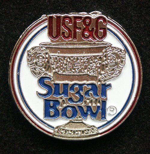 A coin that says usf & g sugar bowl