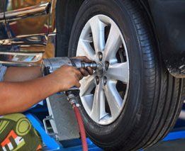 Technician Performing Mobile Wheel Repair Service