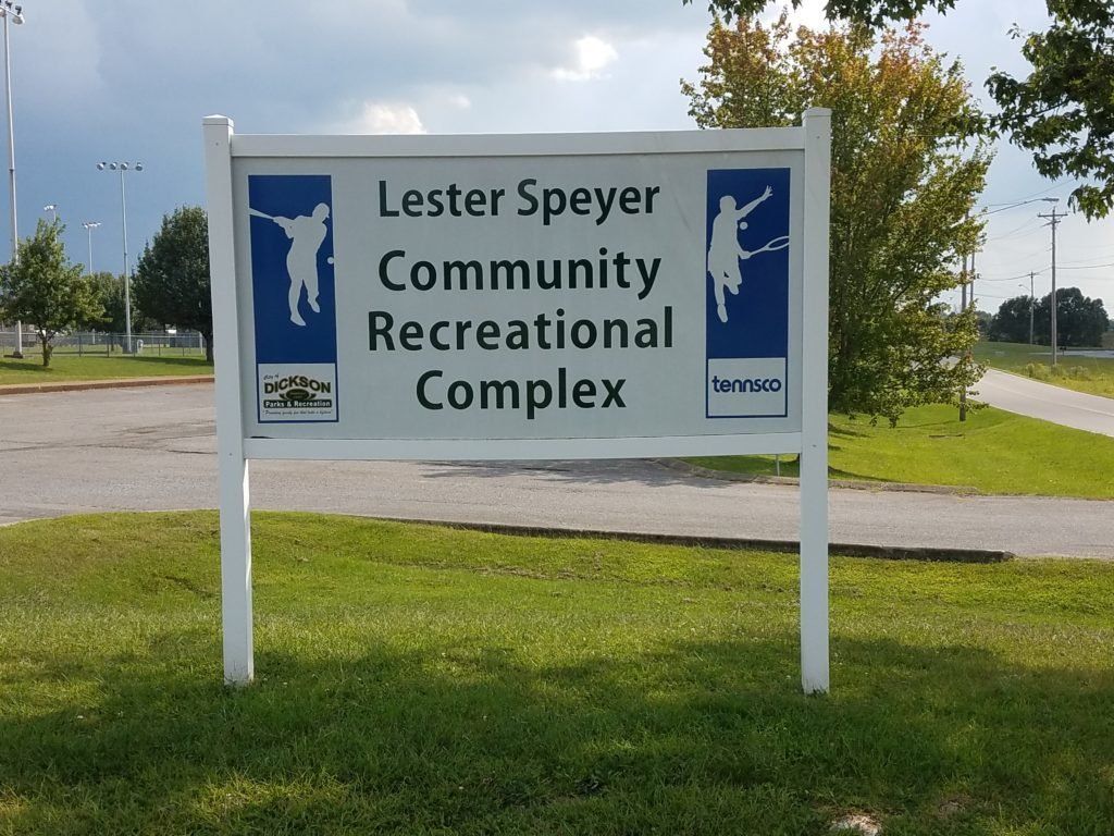 Sign for Lester Speyer Community Recreational Complex on a grassy roadside