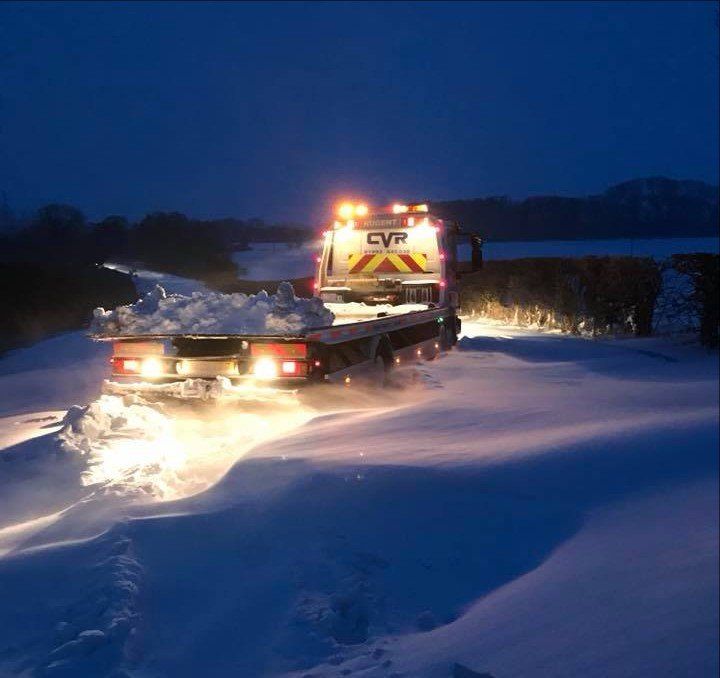 recovery truck in snow