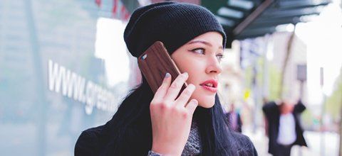 A woman talking over phone