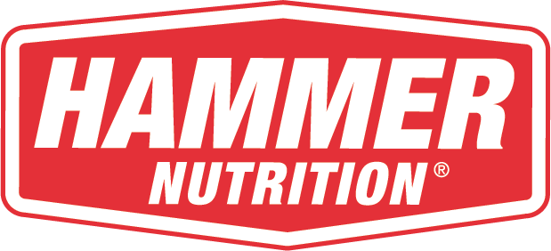 A red and white logo for hammer nutrition.