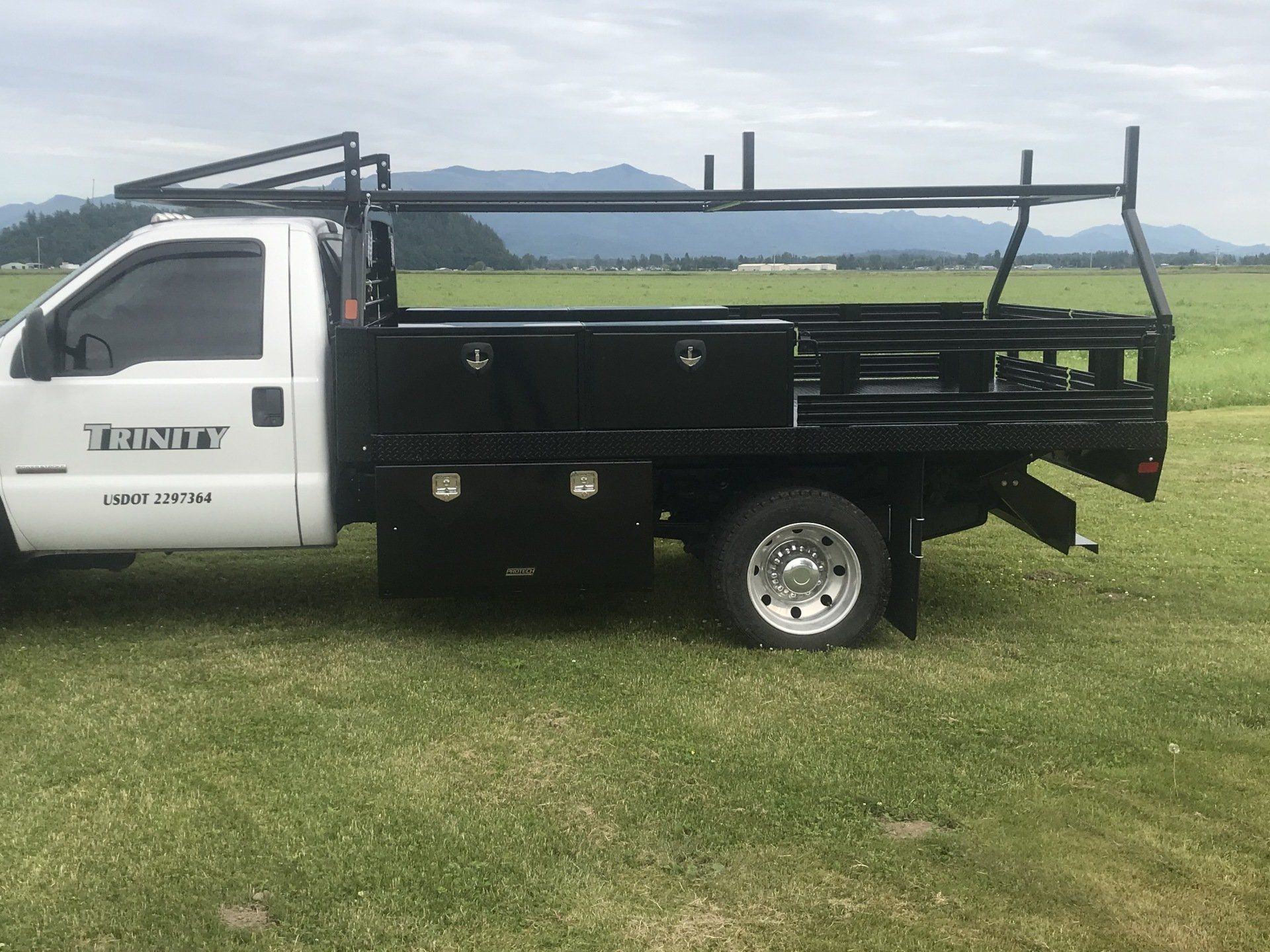 12' Contractor body w/ 24x24x48 Protech underbody boxes