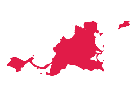 Red silhouette of Saint Martin against a white background.
