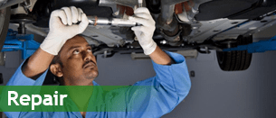 Man Working under Car - Auto Repair Man Working under Car - Auto Repair