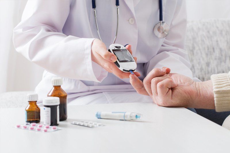 A Doctor Checking Glucose Levels — Wayne, NJ — ValuRX Pharmacy A Doctor Checking Glucose Levels — Wayne, NJ — ValuRX Pharmacy