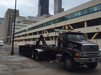 Scrap Metal Services — Black Service Truck in Chicago Heights, IL Scrap Metal Services — Black Service Truck in Chicago Heights, IL