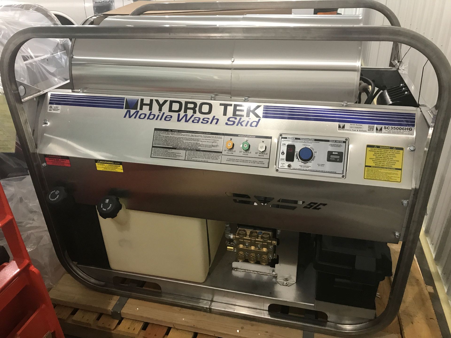Hydro tek mobile pressure washer sitting on pallet