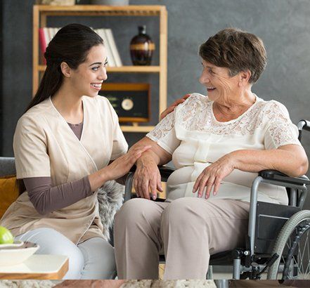 Caregiver and Senior Woman at Home — Columbus, OH — Caring Heart Home Health Agency Caregiver and Senior Woman at Home — Columbus, OH — Caring Heart Home Health Agency