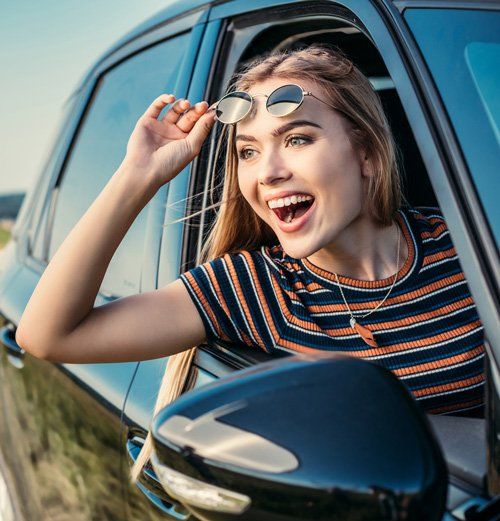 Happy Woman from Car Window — Toms River, NJ — Dover Oil Company Happy Woman from Car Window — Toms River, NJ — Dover Oil Company