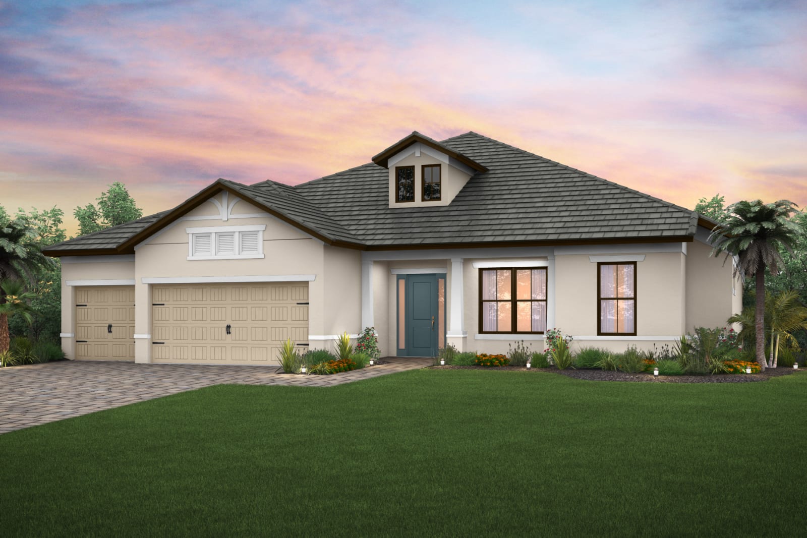 A white house with two garages and a lush green lawn in front of it.