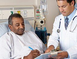 Doctor Explaining Consent Form To Senior Patient — Insurance in Port Orange, FL Doctor Explaining Consent Form To Senior Patient — Insurance in Port Orange, FL