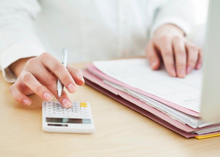 Woman Working in Office — Insurance in Port Orange, FL