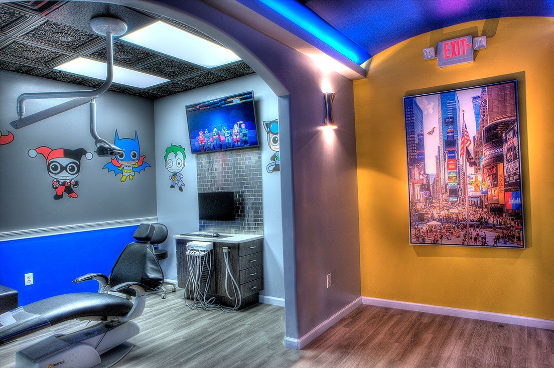 Mighty Smiles Dental, Dallas & Fort Worth. dental office with a painting on the wall.