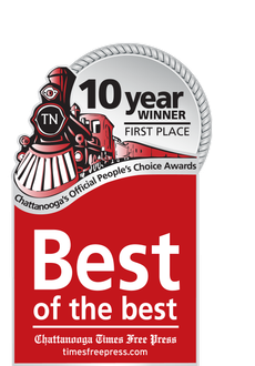 A red sign that says 10 year winner first place best of the best