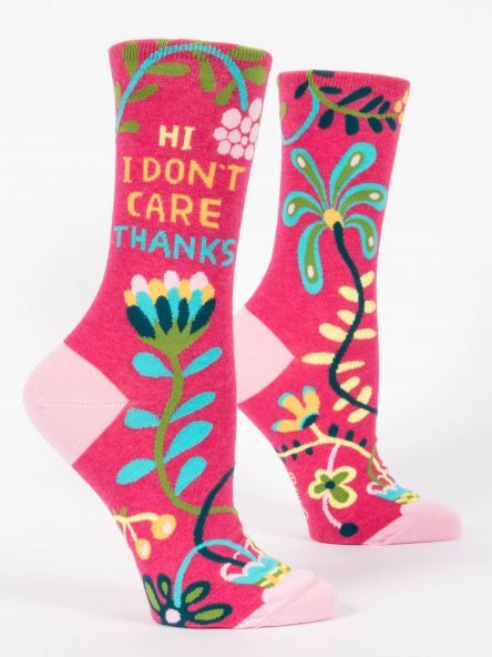 A pair of pink socks that say hi i don t care thanks