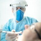 Dentist wearing PPE — Wyoming, MI — Dental South Dentist wearing PPE — Wyoming, MI — Dental South