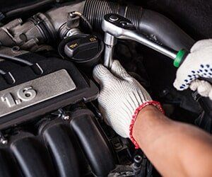 Hands of Car Mechanic - Engine Bearings in Bellflower, CA 