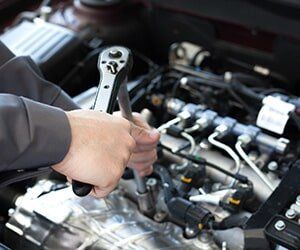 Hand with Wrench -  Engine Filters in Bellflower, CA