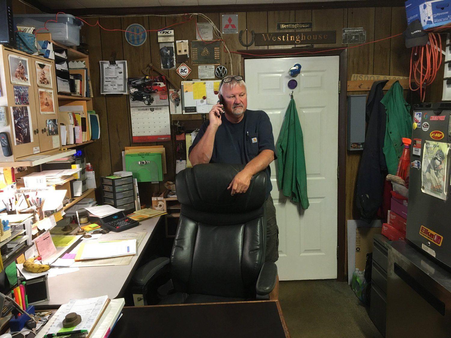 Man Using His Phone — Richmond, VA — Dominion Salvage Inc