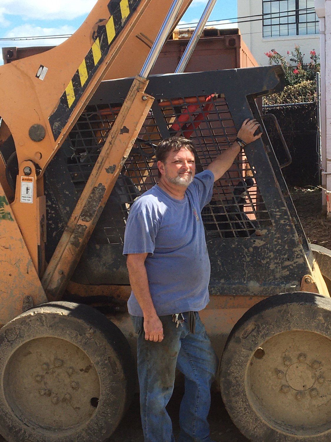 Man Standing Beside The Truck — Richmond, VA — Dominion Salvage Inc