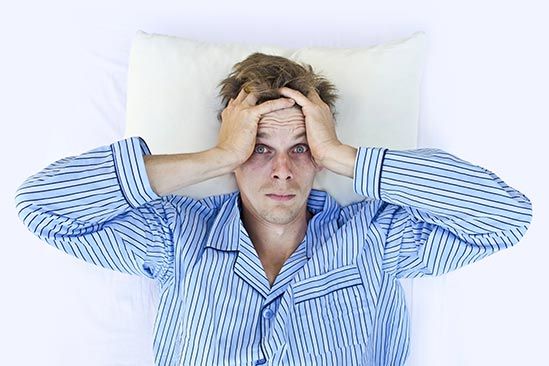 Sad and lonely man seated on his bed — Sleep Apnea in Fairless Hills, PN Sad and lonely man seated on his bed — Sleep Apnea in Fairless Hills, PN