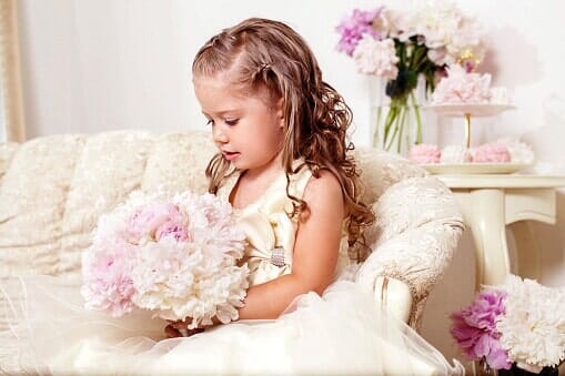Flower Girl holding Bouquet  — Wedding Shop in Brooklyn, NY