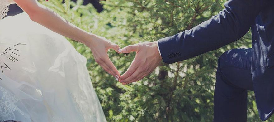 Couple Holding Hands — Wedding Shop in Brooklyn, NY