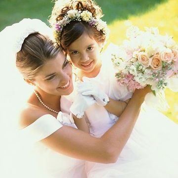 Bride with Flower Girl — Wedding Shop in Brooklyn, NY Bride with Flower Girl — Wedding Shop in Brooklyn, NY