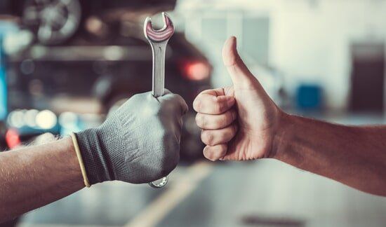 Handsome Auto Service Workers — Carburetor in Greenwood, SC Handsome Auto Service Workers — Carburetor in Greenwood, SC
