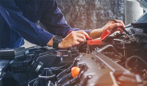 Hands of Car Mechanic — Mike's Automotive & Muffler Service in Greenwood, SC Hands of Car Mechanic — Mike's Automotive & Muffler Service in Greenwood, SC