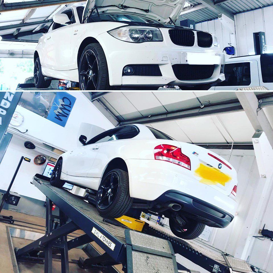 white car in a lift
