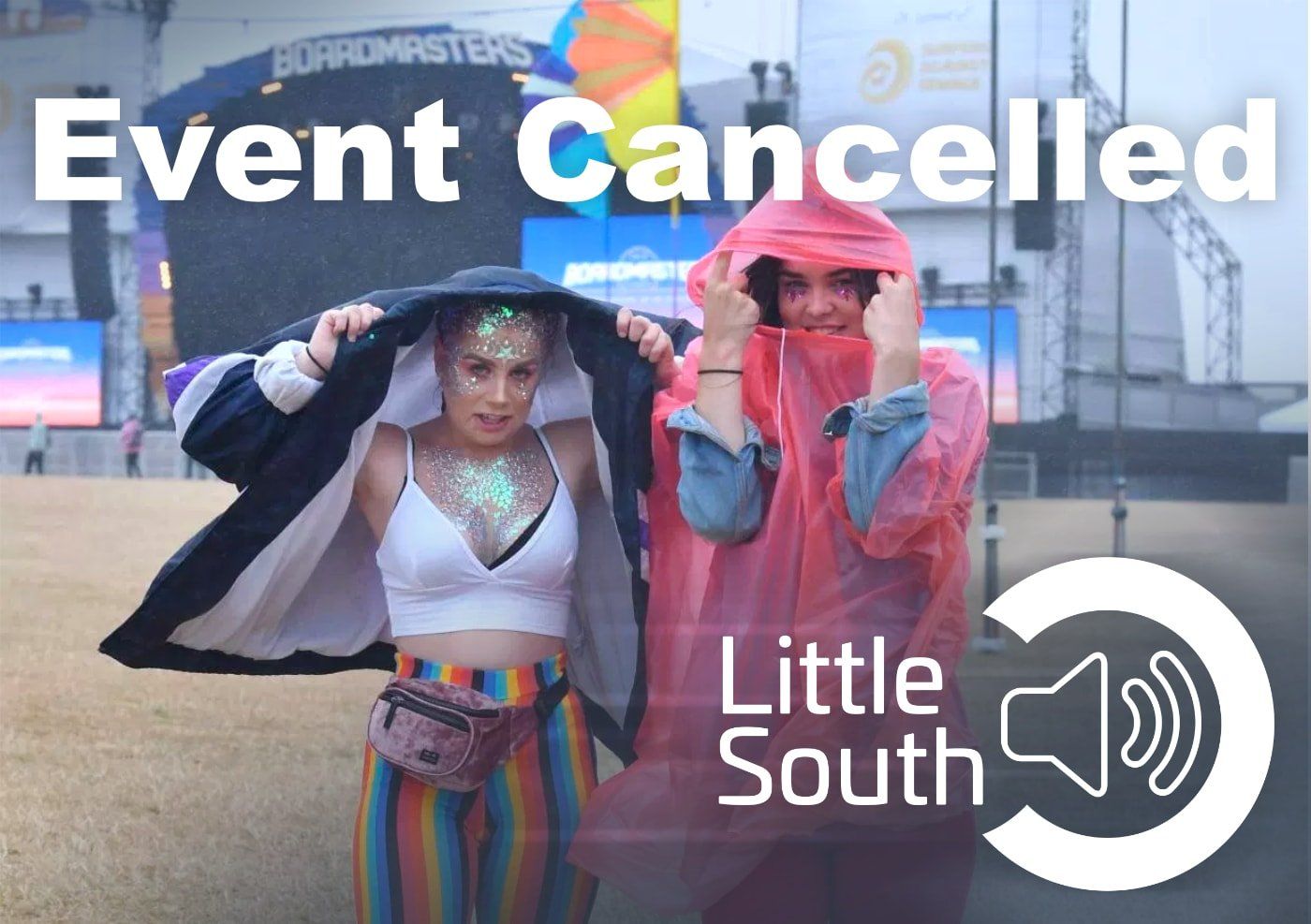 A couple of people standing next to each other in front of a sign that says event cancelled