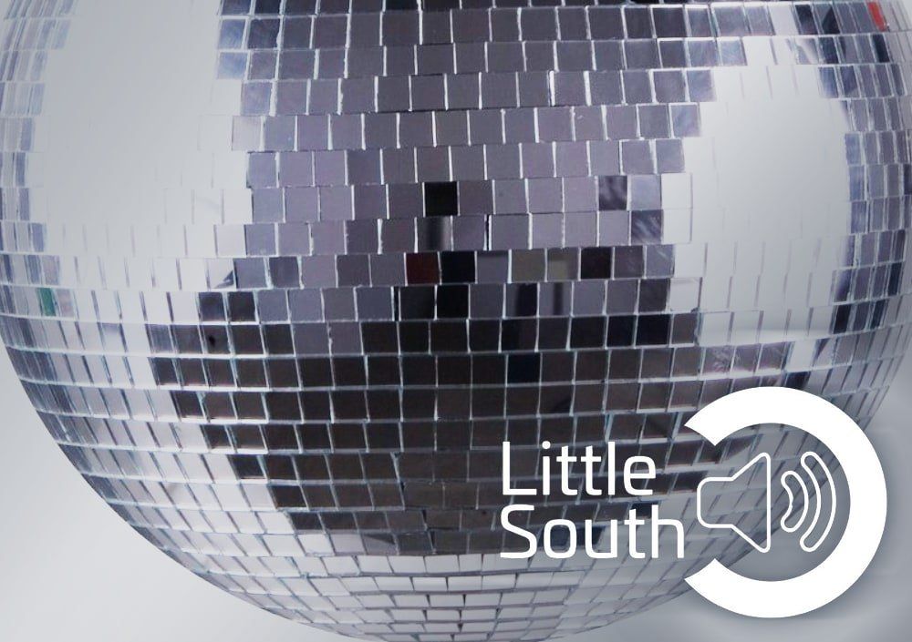 A disco ball with the words little south on it