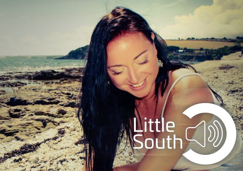 A woman on a beach with the words little south on the bottom
