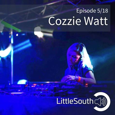 A woman is playing a dj set in a dark room.