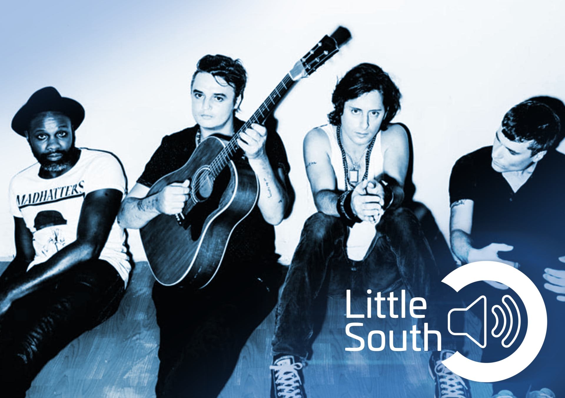 A black and white photo of a band called little south