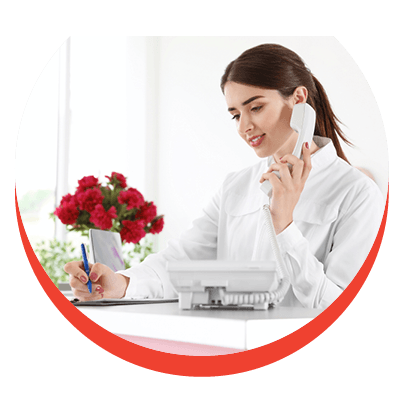 Receptionist taking order on phone