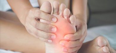 Foot Pain — Woman Feeling Pain in Her Foot in Laredo, TX Foot Pain — Woman Feeling Pain in Her Foot in Laredo, TX
