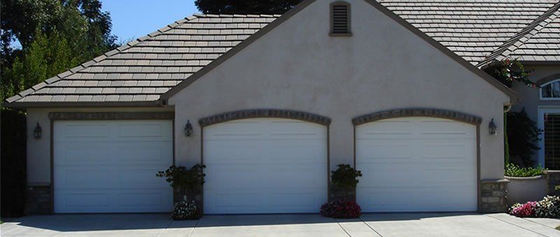 Nice Stucco Three Doors Before — Diamond Springs, CA — Sierra Nevada Overhead Door
