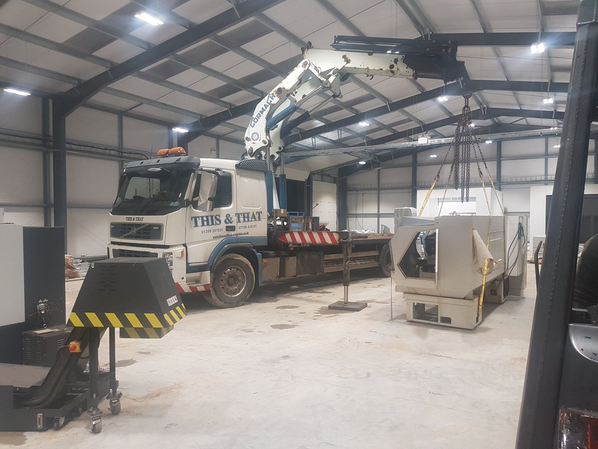 lorry crane used in a warehouse