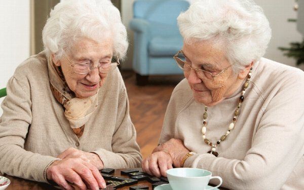 Senior women having coffee