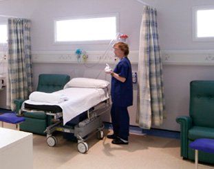 University Hospitals Bristol a bed with a nurse