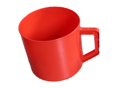 A red plastic cup with a handle on a white background