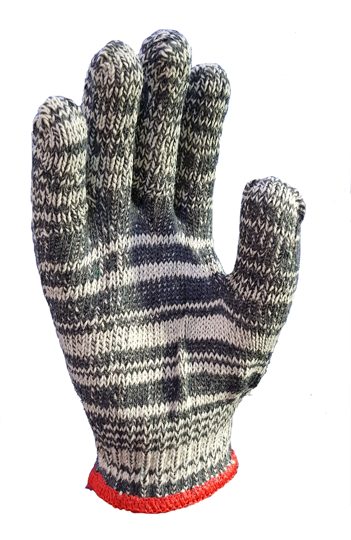 A close up of a knitted glove on a white background.