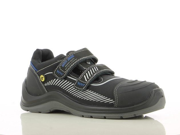 A pair of black and blue safety shoes on a white surface.