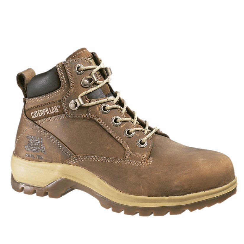 A pair of brown caterpillar boots on a white background