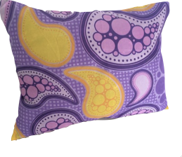 A purple pillow with a yellow and pink paisley pattern