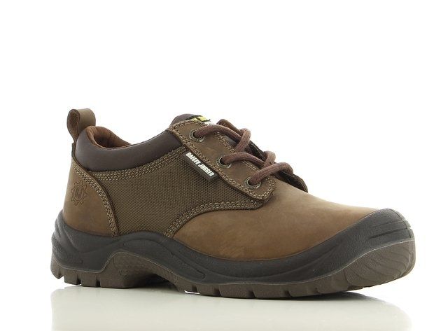 A pair of brown safety shoes on a white surface