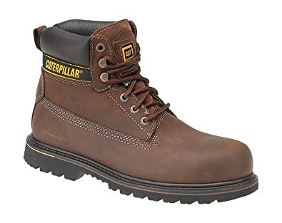 A pair of brown caterpillar boots on a white background.